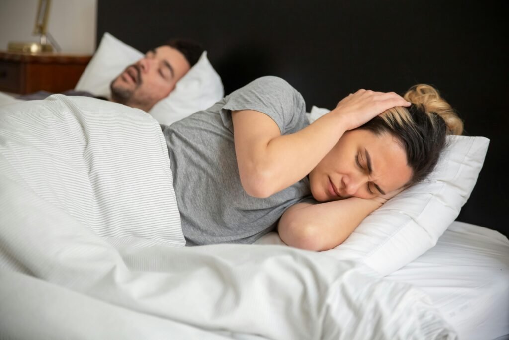 Spouse sleepless frustration when partner snores